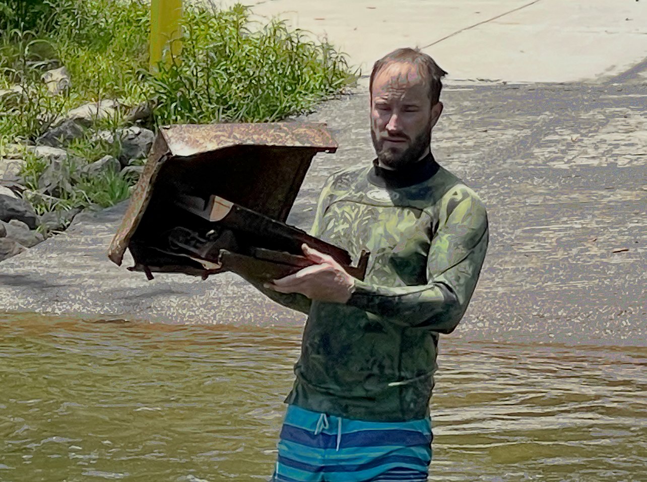 Empty cash register pulled from the bottom of Mountain Island Lake